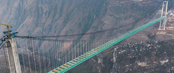 贵州花江峡谷大桥创多项世界纪录 天堑变通途助力乡村振兴